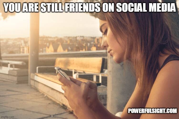 A girl chatting on her phone showing the signs your ex-girlfriend will eventually come back