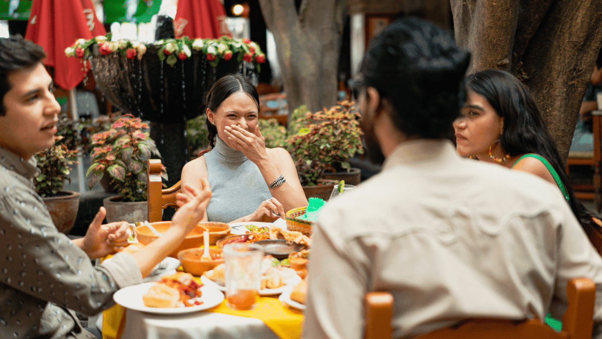 Group of good friends eating